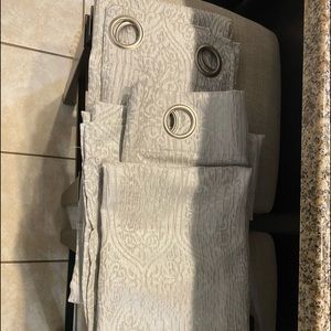 Gray/silver grommet panels